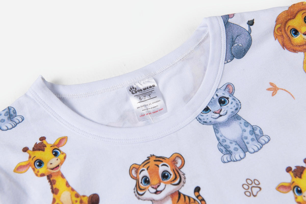 Close-up of the neckline and premium stitching on white animal print pyjamas