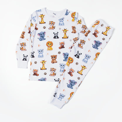 Flat lay of white animal print children's pyjama set with long sleeve top and bottoms