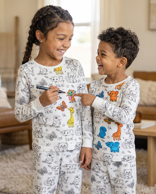 Kids wearing Animal Colouring Pyjamas and showing their coloured animal designs