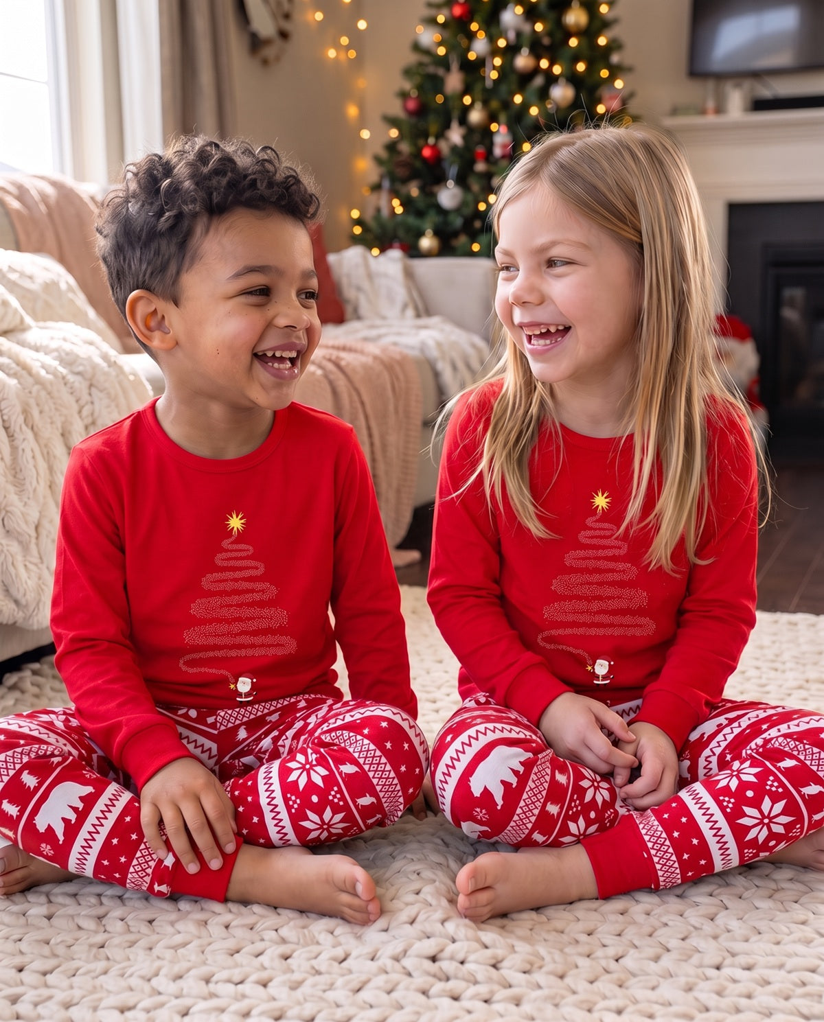 Kids snuggled up on Christmas time wearing their matching Cubwear PJs