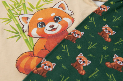 Two fabric pieces featuring cute red panda illustrations, one in beige with green bamboo and one in dark green with small red panda prints.