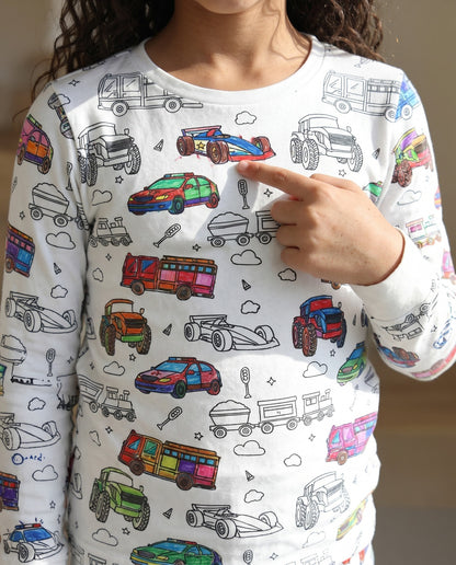 Child wearing Vehicle Colouring Pyjamas featuring cars, trucks, diggers and tractors